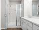 Modern bathroom featuring a glass shower and a vanity with sink at 7 Hydrangea Unit 70 Way, Auburn, GA 30011