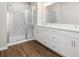 Modern bathroom featuring a glass shower and a vanity with double sinks at 7 Hydrangea Unit 70 Way, Auburn, GA 30011