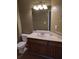 Bathroom with a single sink vanity, and standard toilet at 10 Chapman Way, Covington, GA 30016