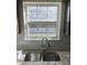 Kitchen sink with stainless steel faucet, granite countertops and subway tile backsplash at 10 Chapman Way, Covington, GA 30016
