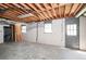 Unfinished basement featuring a concrete floor, exposed ductwork, and potential for customization and expansion at 2647 Wood Hollow Dr, Dunwoody, GA 30360
