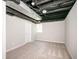 Finished basement featuring carpeting, painted walls and ceiling, and one window providing natural light at 2647 Wood Hollow Dr, Dunwoody, GA 30360