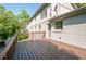 Spacious wooden deck overlooking a green yard, perfect for outdoor entertaining and relaxation at 2647 Wood Hollow Dr, Dunwoody, GA 30360