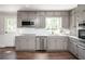 Charming kitchen with stainless appliances, updated cabinets, and modern countertops at 2647 Wood Hollow Dr, Dunwoody, GA 30360