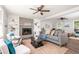 Bright living room with a cozy seating area, fireplace, and natural light at 2647 Wood Hollow Dr, Dunwoody, GA 30360