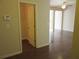 Hallway leading to an open-concept living area that offers a seamless flow for entertaining and everyday life at 3352 Brockenhurst Dr, Buford, GA 30519
