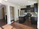 Beautiful kitchen with dark cabinets, stainless appliances, and a center island at 3352 Brockenhurst Dr, Buford, GA 30519