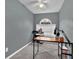 Bedroom with plush carpet, a ceiling fan, and natural light from the windows at 1514 Log Cabin Ln, Lawrenceville, GA 30045