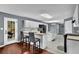 Kitchen area with island, gray floors, and an exit to the deck at 1514 Log Cabin Ln, Lawrenceville, GA 30045