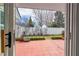 Backyard patio overlooking well-maintained fenced yard at 1905 Cottage Grove Way, Cumming, GA 30040