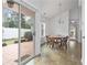 Dining area with backyard patio access and neutral color palette at 1905 Cottage Grove Way, Cumming, GA 30040