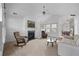Cozy living room with fireplace, vaulted ceiling, and neutral color palette at 1905 Cottage Grove Way, Cumming, GA 30040