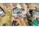 Aerial view of home highlighting deck, large driveway, and mature trees at 491 Lees Sw Trce, Marietta, GA 30064