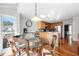 Charming breakfast nook with hardwood floors adjacent to the kitchen at 491 Lees Sw Trce, Marietta, GA 30064