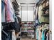 A spacious walk-in closet with metal shelving and rods for ample storage at 491 Lees Sw Trce, Marietta, GA 30064