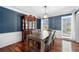 Chic dining room featuring hardwood floors and a classic china cabinet at 491 Lees Sw Trce, Marietta, GA 30064