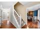 Inviting entryway featuring hardwood floors and a view of the dining room at 491 Lees Sw Trce, Marietta, GA 30064