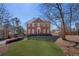 Charming two-story brick home with a manicured lawn and mature landscaping at 491 Lees Sw Trce, Marietta, GA 30064