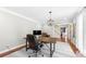 Bright office space with hardwood floors and comfortable seating area at 491 Lees Sw Trce, Marietta, GA 30064