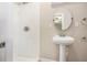 Bathroom featuring stand-up shower and pedestal sink at 2917 1St Sw Ave, Atlanta, GA 30315