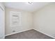Comfortable bedroom with new carpeting, neutral paint, and a bright window, offering a serene atmosphere at 2917 1St Sw Ave, Atlanta, GA 30315