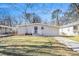 Inviting single-story home with a well-kept lawn, enhanced by a freshly painted facade and welcoming entryway at 2917 1St Sw Ave, Atlanta, GA 30315