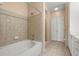 Bathroom features a neutral color scheme, tiled shower and tub combination at 400 17Th Street Nw # 1304, Atlanta, GA 30363