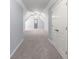 Attic bonus room featuring neutral carpet and white doors at 1348 Ewing Creek Dr, Dacula, GA 30019