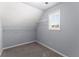Walk-in closet with wire shelving and a window for natural light at 1348 Ewing Creek Dr, Dacula, GA 30019