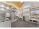 Custom closet with built-in shelving, cabinets, drawers and large windows at 1348 Ewing Creek Dr, Dacula, GA 30019
