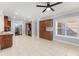 Dining area featuring tile flooring, window, and built-in cabinetry at 1348 Ewing Creek Dr, Dacula, GA 30019