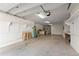 Spacious garage area offering storage, workspace, and convenient access at 1348 Ewing Creek Dr, Dacula, GA 30019
