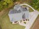Overhead shot of the house showing the roof, landscaping, and outdoor living spaces at 3500 Parkwood Hills Ct, Snellville, GA 30078