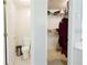 Bathroom and closet with neutral colors and an open layout at 3500 Parkwood Hills Ct, Snellville, GA 30078