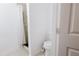 Neutral bathroom with tile shower and toilet at 3500 Parkwood Hills Ct, Snellville, GA 30078