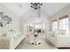 Open-concept living room offering clear sightlines to the modern kitchen and breakfast nook at 3500 Parkwood Hills Ct, Snellville, GA 30078