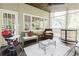 View of screened in patio featuring outdoor furniture and view of the backyard at 3500 Parkwood Hills Ct, Snellville, GA 30078