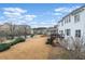 Expansive backyard featuring a spacious deck and views of the surrounding neighborhood at 650 Village Crest Dr, Suwanee, GA 30024