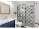 Stylish bathroom features a modern sink, a toilet, and a walk-in shower with decorative tiling at 650 Village Crest Dr, Suwanee, GA 30024