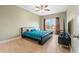 Comfortable bedroom with hardwood floors and neutral colors at 650 Village Crest Dr, Suwanee, GA 30024