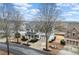 Charming two-story traditional home with well-manicured front yard and mature trees at 650 Village Crest Dr, Suwanee, GA 30024