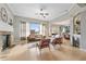 Bright living room features fireplace, hardwood floors, and open floor plan at 650 Village Crest Dr, Suwanee, GA 30024