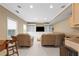 Inviting living room featuring recessed lighting, and white built-in shelving at 650 Village Crest Dr, Suwanee, GA 30024