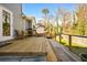 Sunny back deck with a grill, seating, and a view of the yard at 981 Cobb Place Manor Dr, Marietta, GA 30066