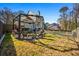 Spacious backyard featuring a gazebo with seating and a well-maintained lawn at 981 Cobb Place Manor Dr, Marietta, GA 30066