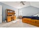 Bedroom featuring neutral paint, carpet, window with blinds, desk and natural light at 981 Cobb Place Manor Dr, Marietta, GA 30066