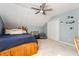 Cozy bedroom with a ceiling fan, neutral walls, and carpeted floors at 981 Cobb Place Manor Dr, Marietta, GA 30066