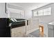 Cozy bedroom loft space with neutral paint, carpet, white railing and natural light at 981 Cobb Place Manor Dr, Marietta, GA 30066
