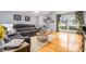 Comfortable living room featuring hardwood floors, a large window, and modern decor at 981 Cobb Place Manor Dr, Marietta, GA 30066