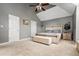 Spacious primary bedroom featuring vaulted ceilings, neutral decor, and ample natural light at 981 Cobb Place Manor Dr, Marietta, GA 30066